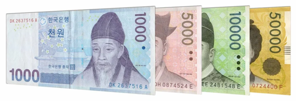 Imagem com as cédulas de Won Sul-Coreano. Notas de 1000, 5000, 1000 e 50000.